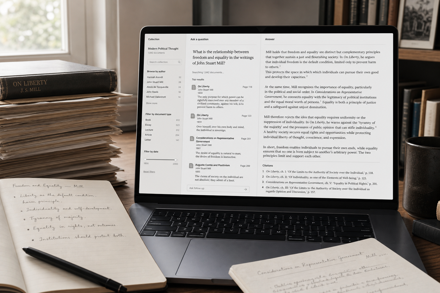AskJ research assistant with cited answers on a laptop